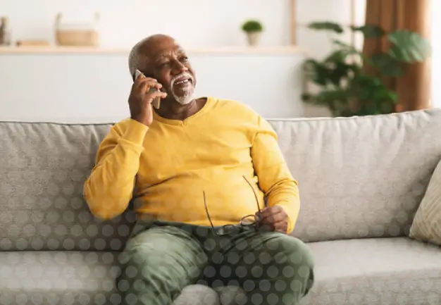 mobiliy plus man sitting on sofa